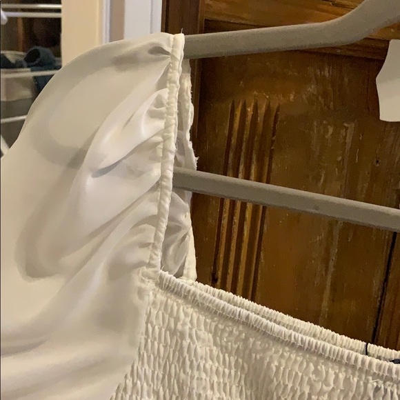 Trendy white smocked top with puffy sheer sleeves - Picture 2 of 5